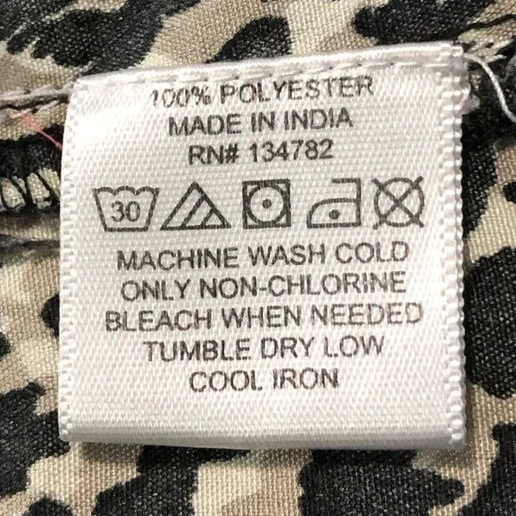 Loose Fit Leopard Print Sleeveless Front Tie Button Up Blouse from Indulge 2X - Picture 7 of 10